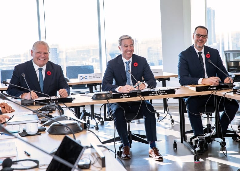 Ontario Premier Doug Ford (left to right) Nova Scotia Premier Tim Houston and Quebec Minister Responsible for Canadian Relations and the Canadian Francophonie Jean-Francois Roberge attend a meeting of Canada's premiers in Halifax