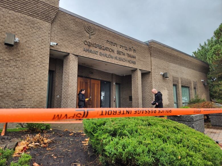 police tape in front of synagogue. 