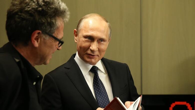 German journalist Hubert Seipel is pictured meeting with Russian President Vladimir Putin in June 2016 in Moscow. 