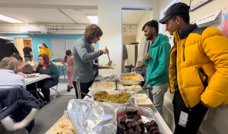 Attendees shared home-cooked meals from a variety of cultures at the event. 