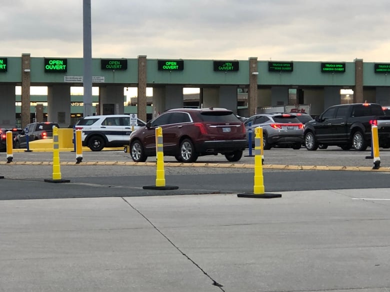 Vehicles heading into a border crossing.