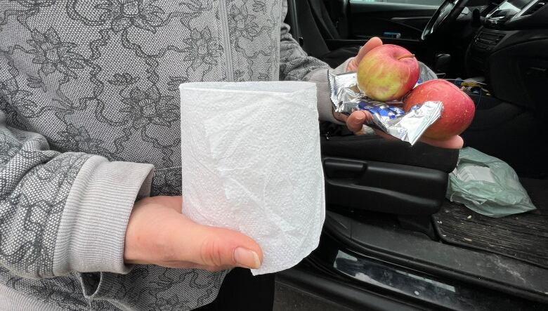 An Ontario woman who's been living in her car since August said keeps a stash of snacks, and toilet paper, on the passenger seat. After three months of being unable to find her own place, she'll move in with her son and his partner on Dec. 1. 