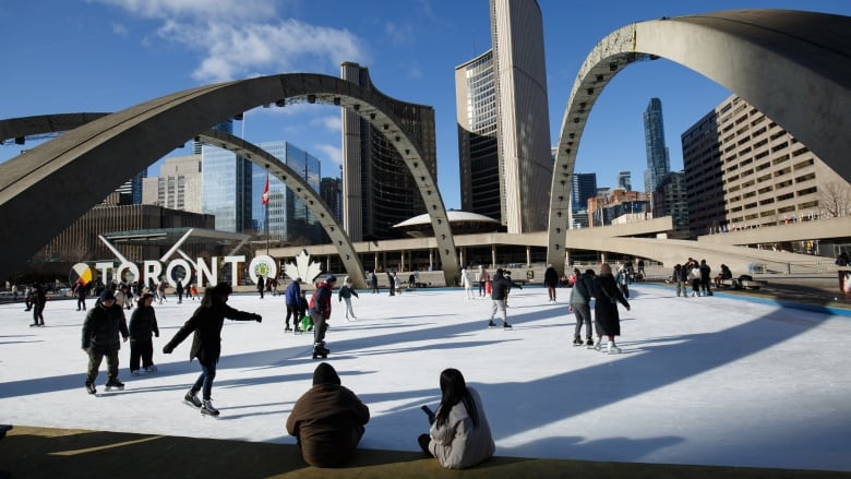 People skate on the ice rink at Nathan Phillips Square--perfect for Family Day long weekend activities--on Feb. 17, 2023. 