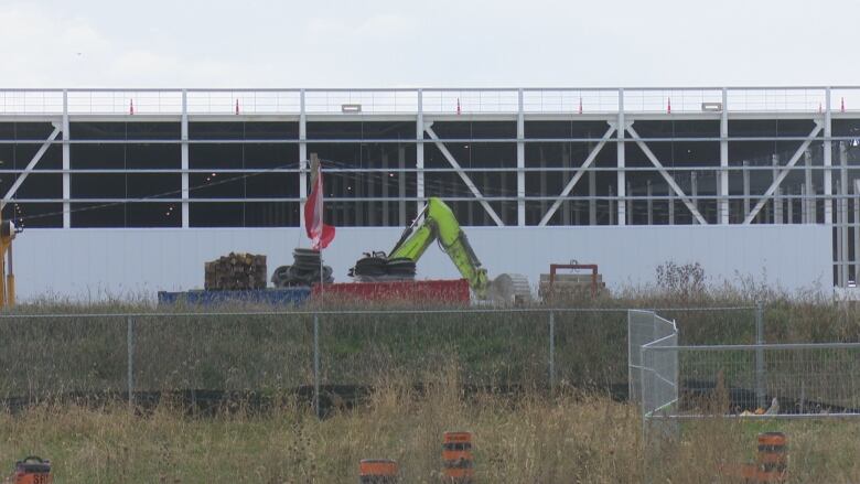 A large industrial building under construction.