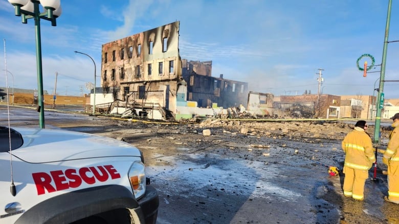 a building is charred and destroyed from the fire