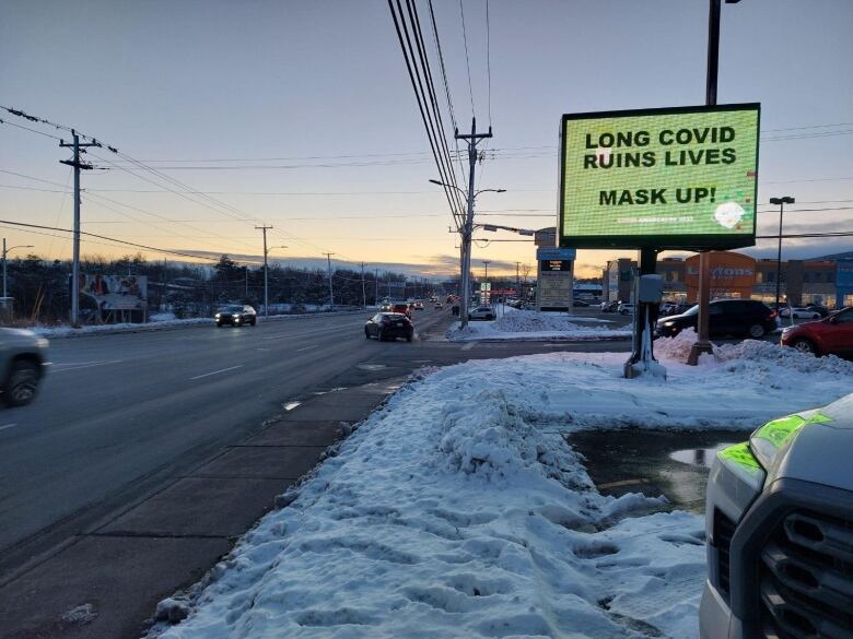 A sign along a road that says 