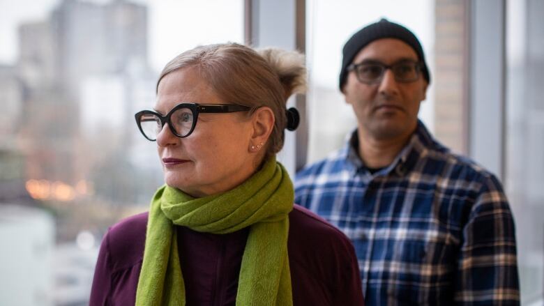 Kris Wallace and Andy Ali are pictured in their apartment in downtown Vancouver,  British Columbia on Thursday, December 14, 2023. 