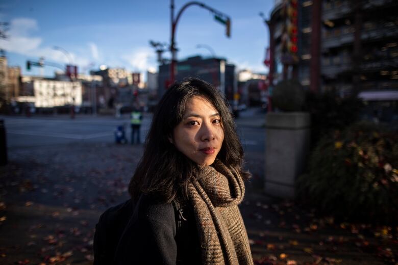 A portrait of a woman looking at the camera.