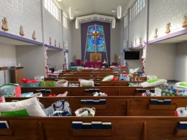 A chapel containing wrapped presents. 