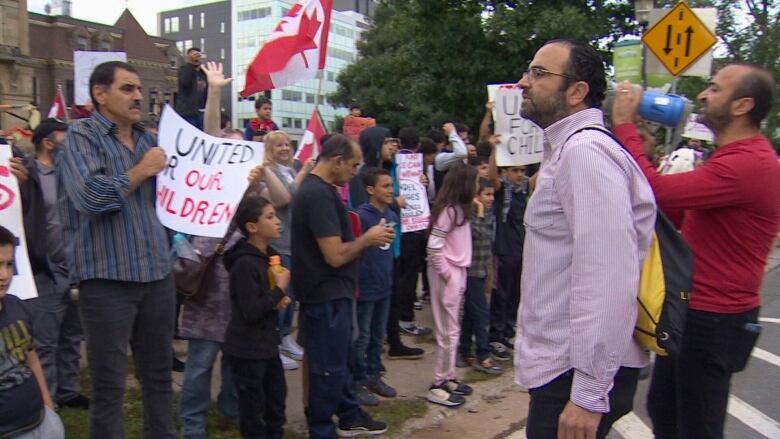 A man looks into a protest