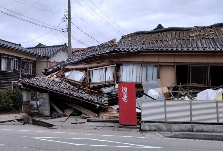 A collapsed house following an earthquake.