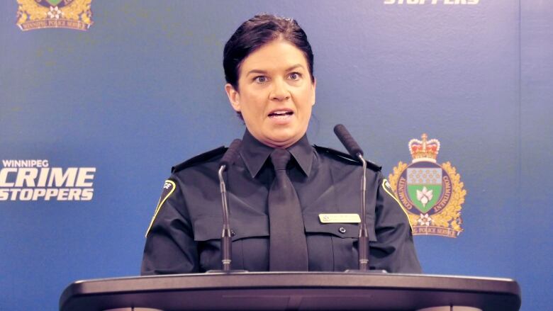 A woman police officer is pictured.