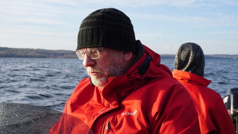 photo of a man on a boat