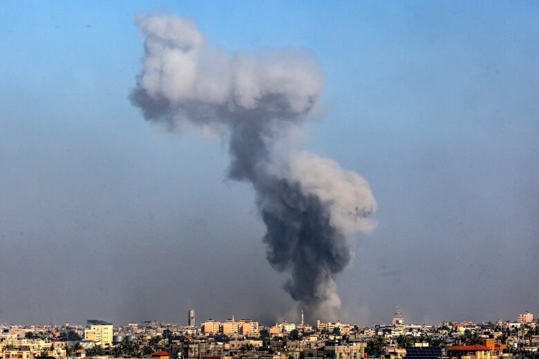 Smoke billows over a southern Gaza city.