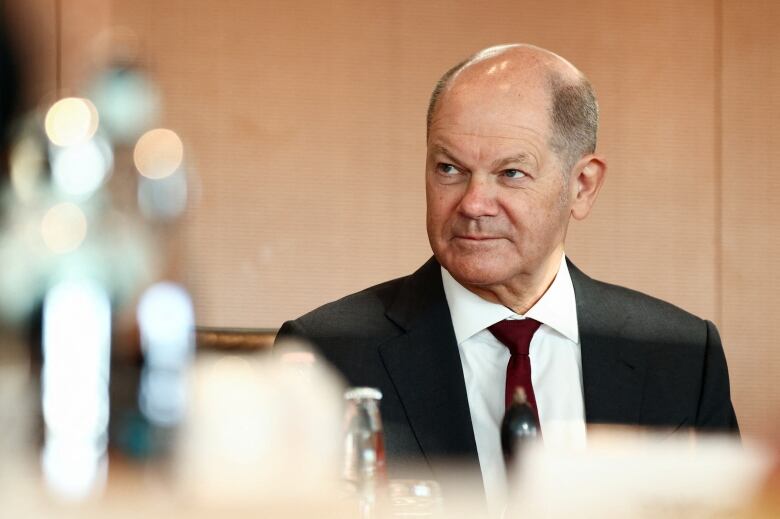 German Chancellor Olaf Scholz, seen here attending a weekly  attends the weekly cabinet meeting n Berlin on January 10, 2024, called for European countries to step up and provide Ukraine with more support. 