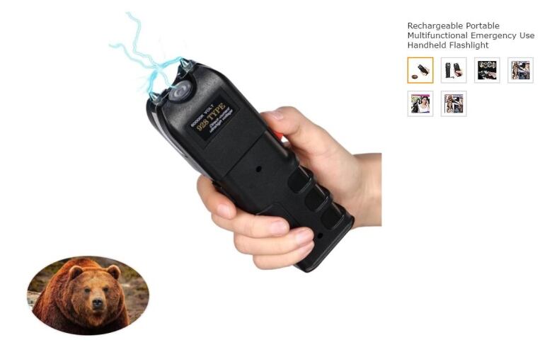 A hand holding a stun gun.