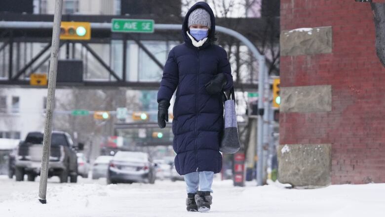 A woman wearing a winter coat.