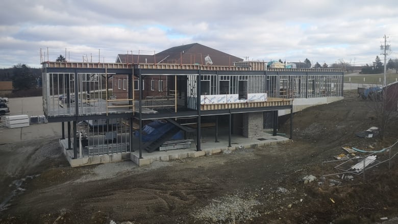 An exterior shot is shown of a health-care centre site that's undergoing an expansion in Meteghan Centre, N.S.