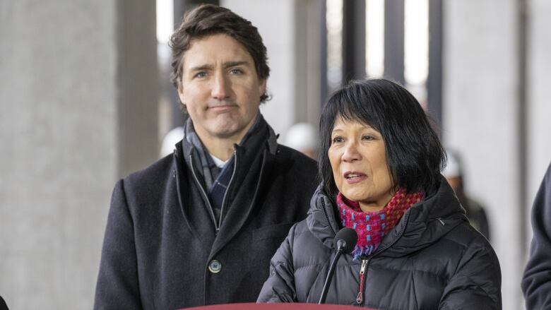 Prime Minister Justin Trudeau (left) listens as Toronto Mayor Olivia Chow speaks at a housing announcement in Toronto on Dec. 21, 2023.