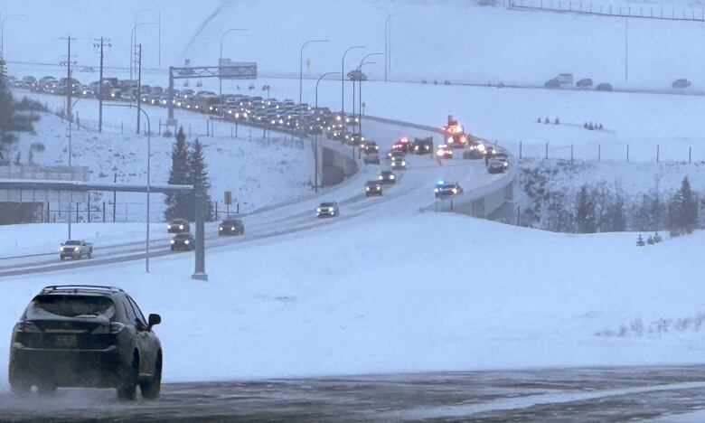 Traffic is snarled by icy roads.