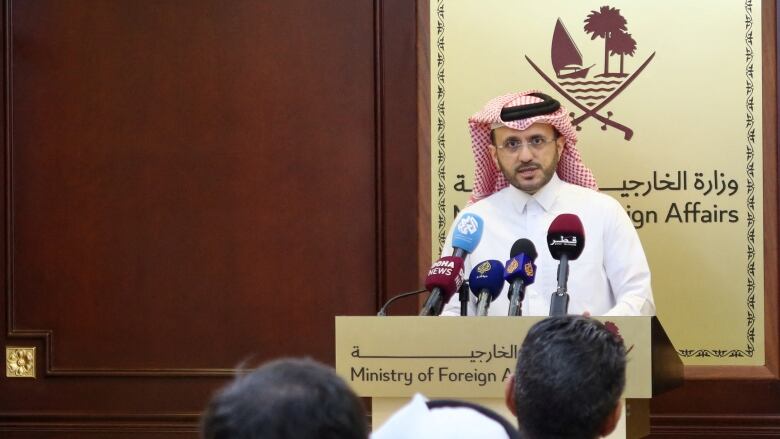 Qatar's Spokesperson for the Ministry of Foreign Affairs, Majed Al-Ansari, speaks to journalists during a press conference in Doha, Qatar, November 23, 2023. 