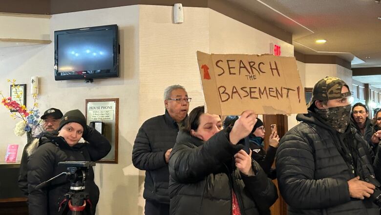 Protestors inside a hotel.