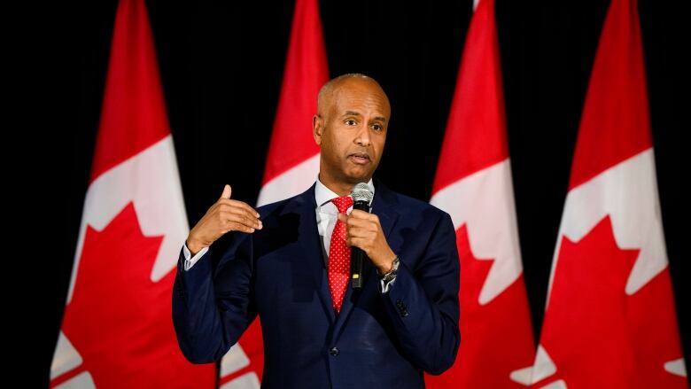 Minister of International Development Ahmed Hussen delivers remarks at a fundraiser event, in Toronto on Friday, Dec. 1, 2023.