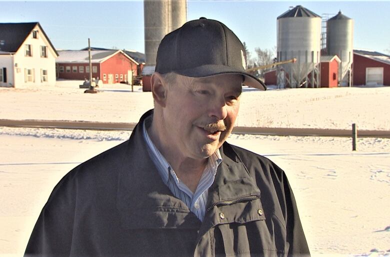 Gordon Sobey outside in winter, wearing hat.