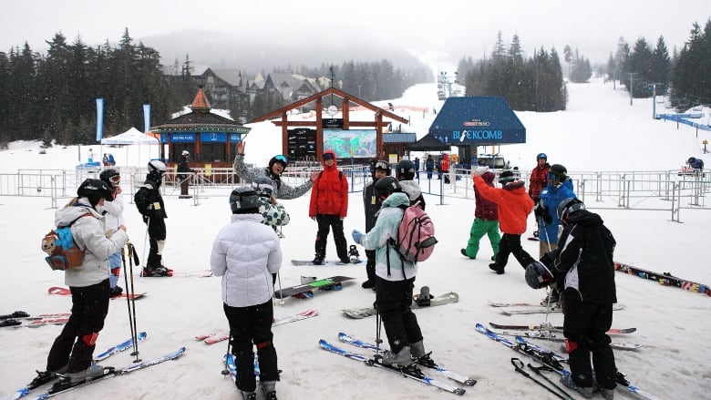 Skiers are pictured at the base of Blackcomb Peak in Whistler, B.C.