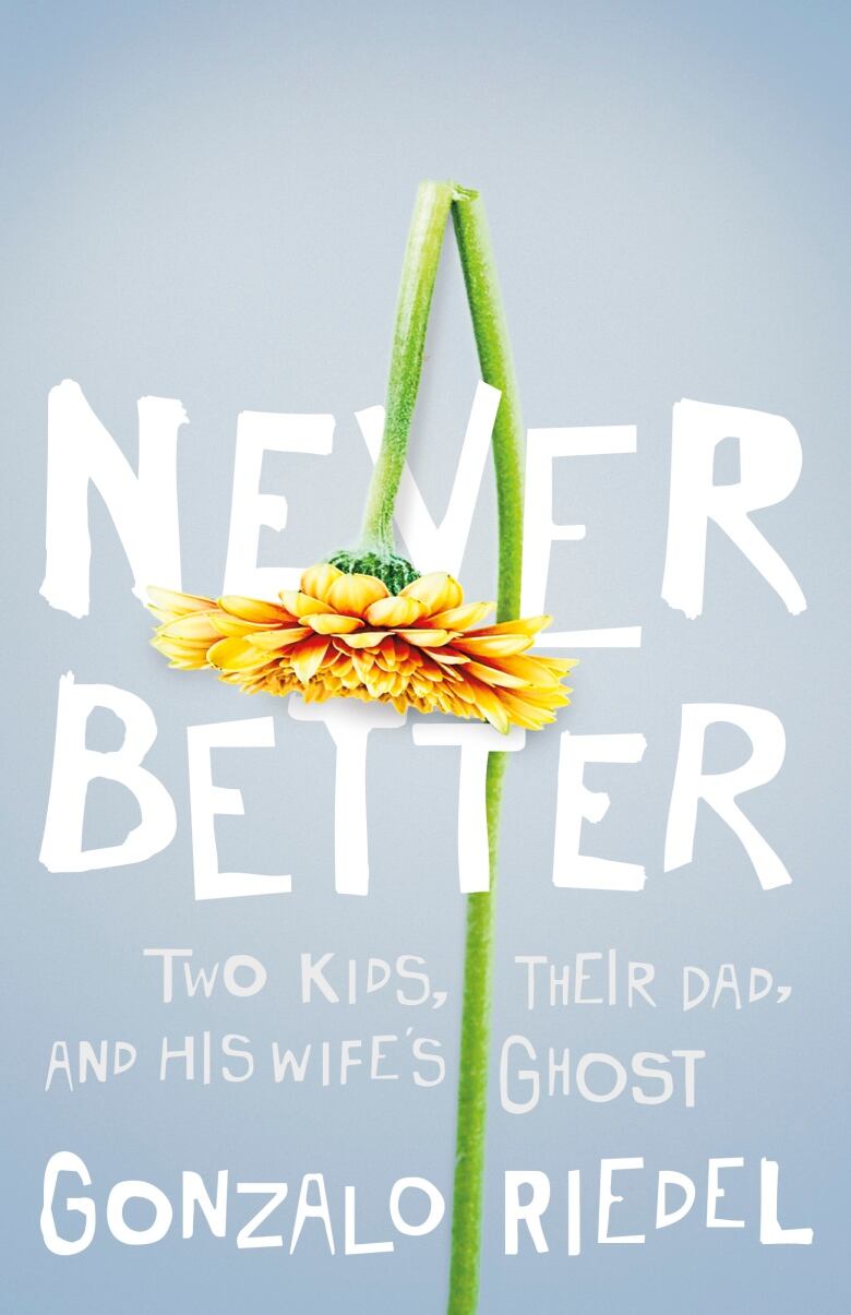 The book cover with the title written in white over a blue background and a flower wilting over it.