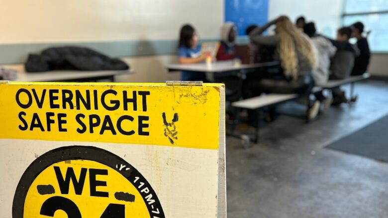 Kids sitting in a table.