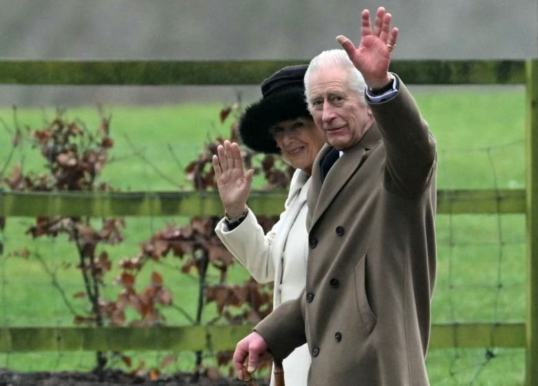 Britain's King Charles III, on the right, and Britain's Queen Camilla.