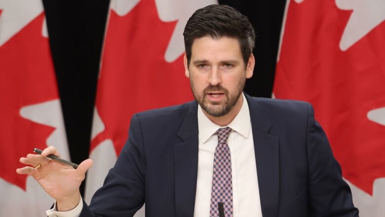 Minister of Housing, Infrastructure and Communities Sean Fraser speaks at a news conference in Ottawa on Tuesday, Feb. 13, 2024.