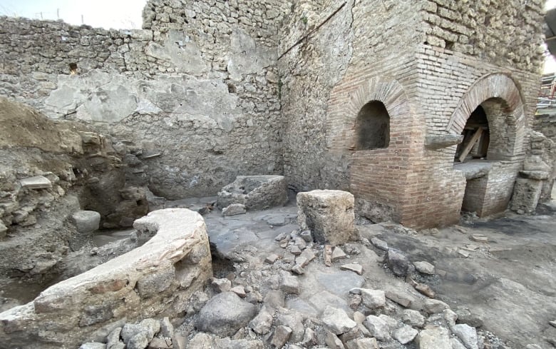 Ancient ruins include what appears to have been a wood-fired oven.