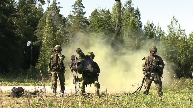 Unidentified soldiers carrying out a test of a Swedish designed RBS 70 NG portable air defence system in this undated handout. Canada will acquire a number of the systems to deploy with troops serving in Latvia. 