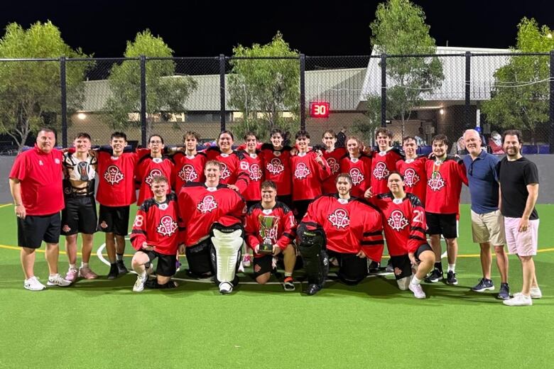 A team photo of the Canadian junior lacrosse team. 