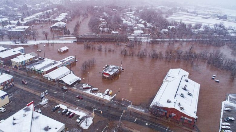 A drone image of a town with lots of flooding