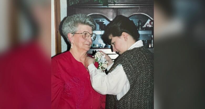 A young white girl with her old mother.