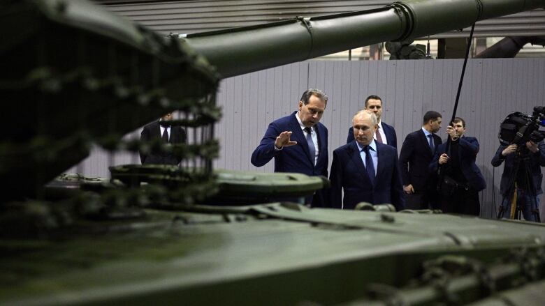 Russia's President Vladimir Putin visits a military plant in the Urals city of Nizhny Tagil, Russia, February 15, 2024.