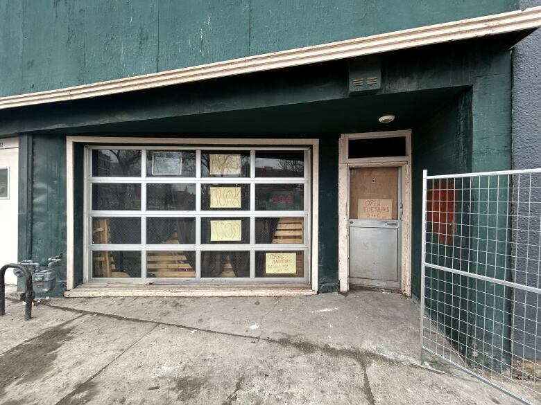 A building with signs in the window.