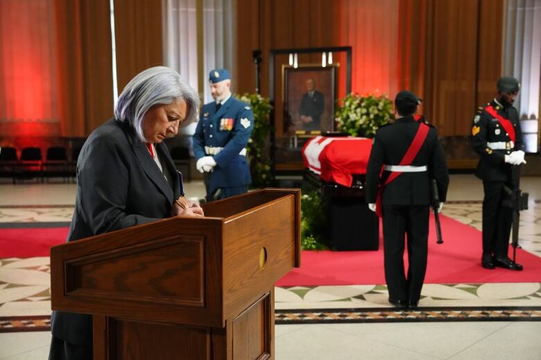 Governor General Mary Simon pays her respects as former prime minister Brian Mulroney lies in state in the Sir John A. Macdonald building opposite Parliament Hill in Ottawa on Tuesday, March 19, 2024. 