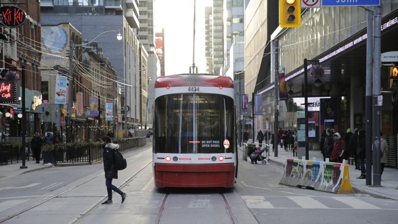 A TTC streetcar at King St and John St, Toronto.