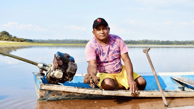 Man on boat.