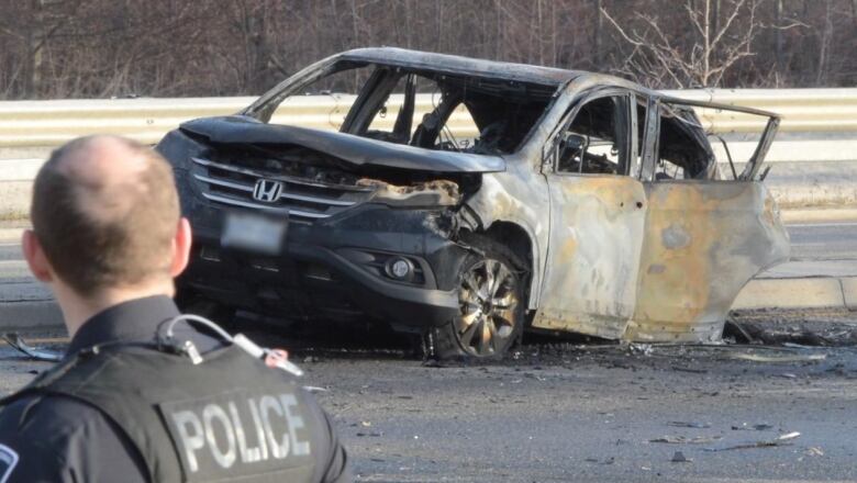 A Honda SUV with extensive damage from collision.