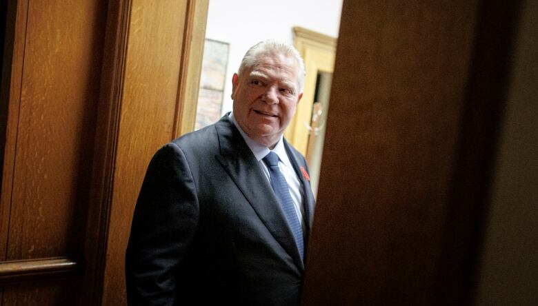 Photo of Doug Ford in a doorway.  