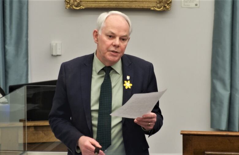 Peter Bevan-Baker standing in the legislature.