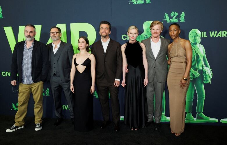 Writer and Director Alex Garland and cast members Nick Offerman, Cailee Spaeny, Wagner Moura, Kirsten Dunst, Jesse Plemons and Jojo T. Gibbs are seen at a movie premiere. 