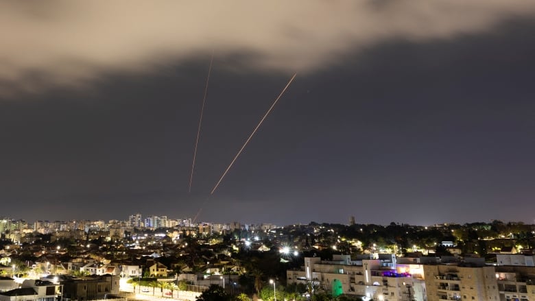 An anti-missile system operates after Iran launched drones and missiles towards Israel, as seen from Ashkelon, Israel April 14, 2024.