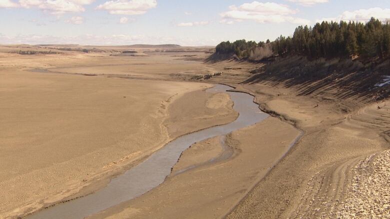 A low river is shown.