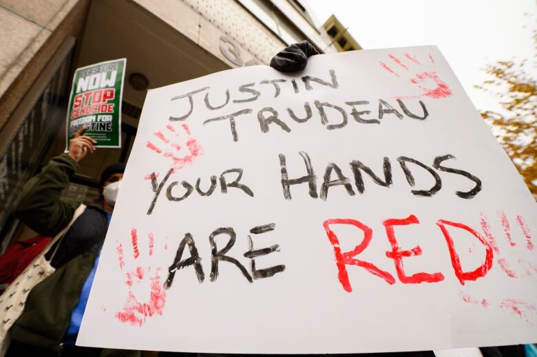 Pro-Palestine demonstrators protest in front of Deputy Prime Minister Chrystia Freelands office in Toronto, Monday, Oct., 30, 2023.